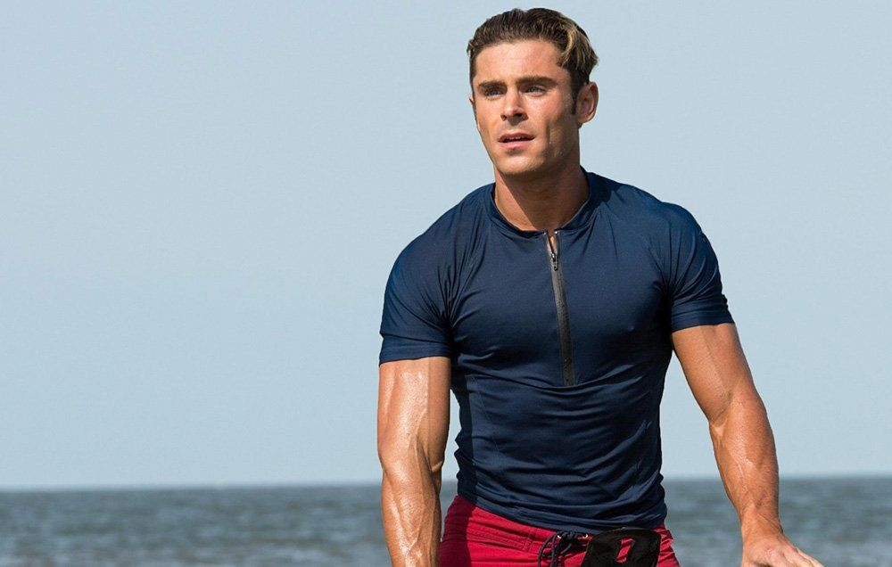 alt="Zac Efron net worth 2025 career highlights at award show"